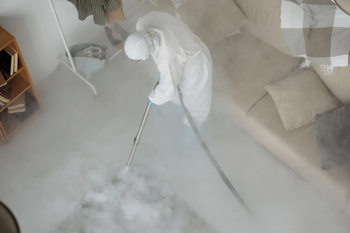 Biohazard cleanup technician in protective equipment, Central, SC
